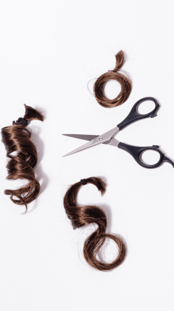 This image shows locks of hair and scissors which emphasize the benefits of getting a hair tissue mineral analysis to check chronic mineral and heavy metal levels in the body.